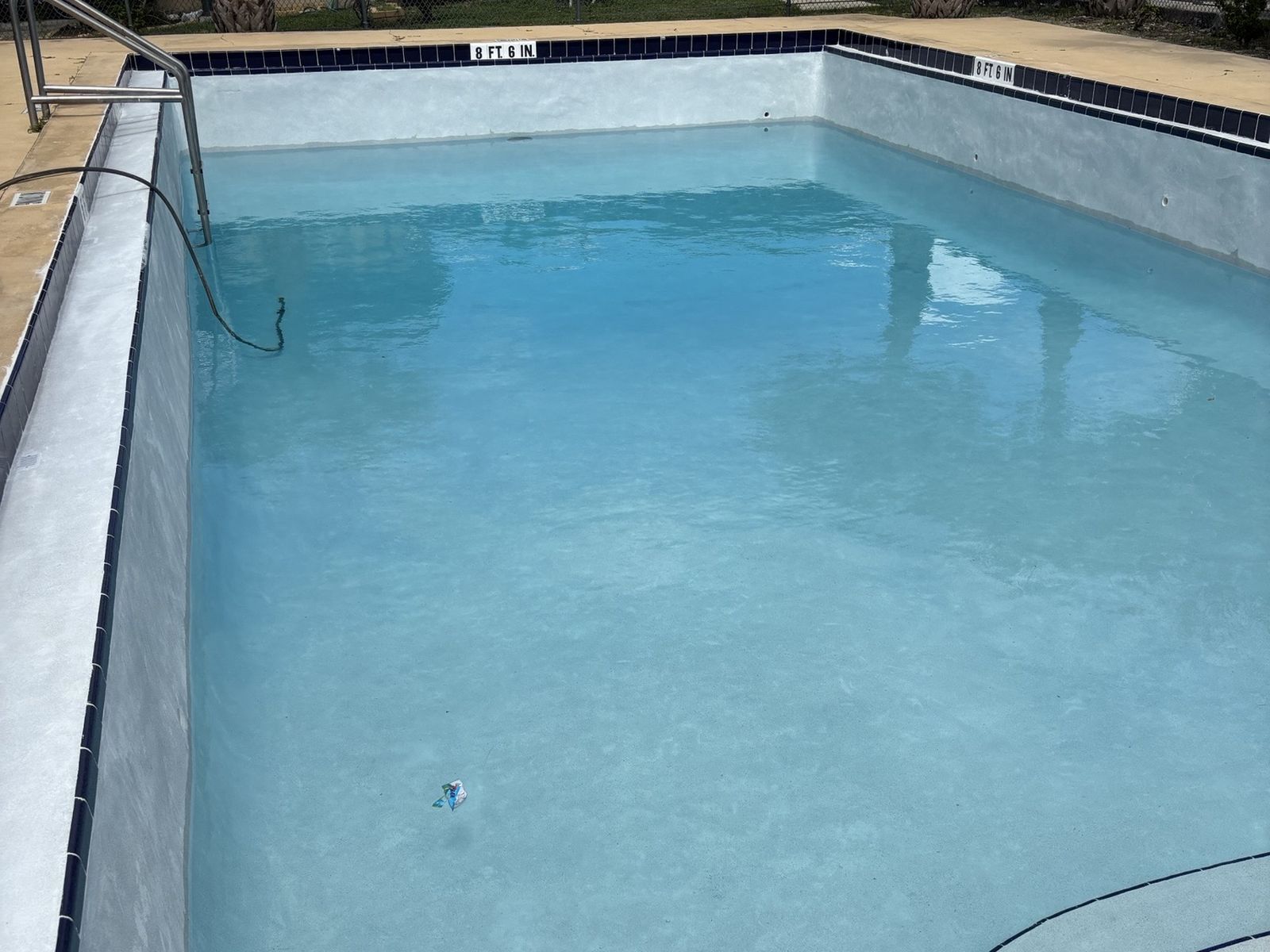 Commercial pool after resurfacing, refilled with a new finish